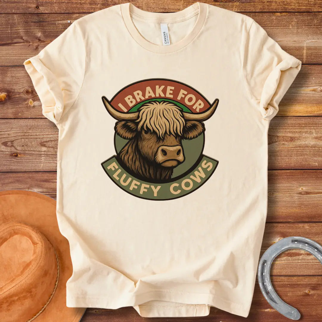 Illustration of a Highland cow's head with the text 'I Brake For Fluffy Cows'