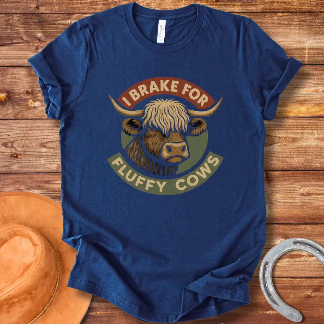Illustration of a Highland cow's head with the text 'I Brake For Fluffy Cows'