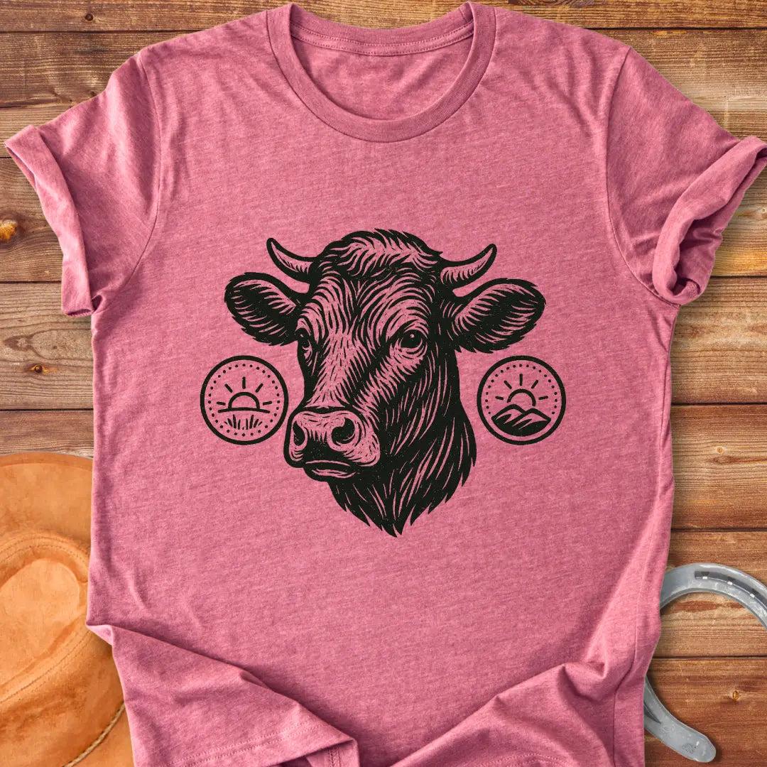 Cattle head silhouette with sunrise, valley, and farmland details, illustration t-shirt design.