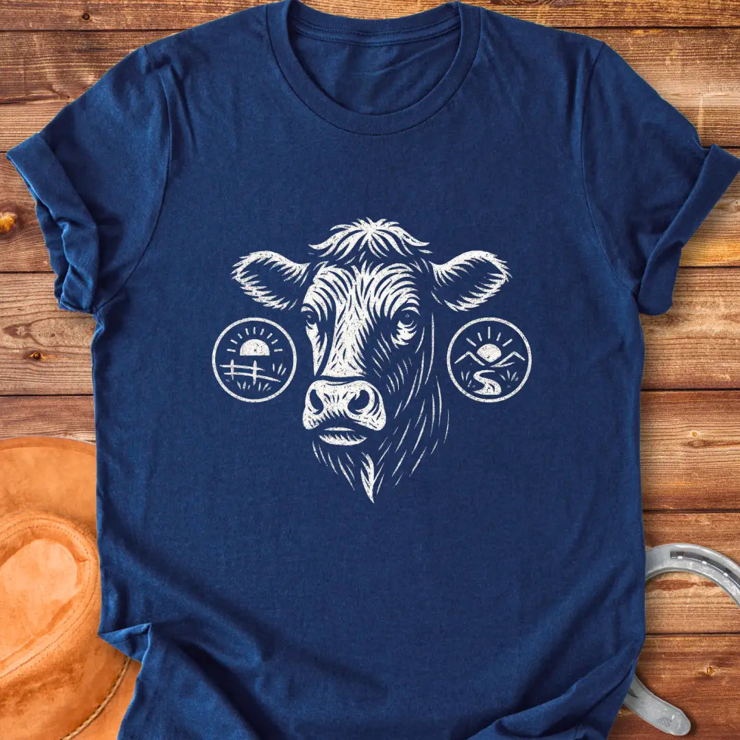 Cattle head silhouette with sunrise, valley, and farmland details, illustration t-shirt design.