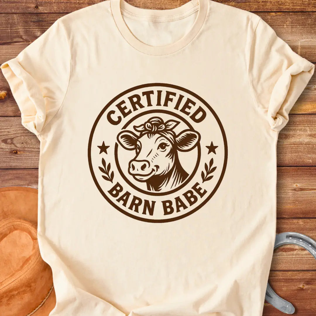Certified Barn Babe T-shirt design with a happy cow illustration inside a circular badge.