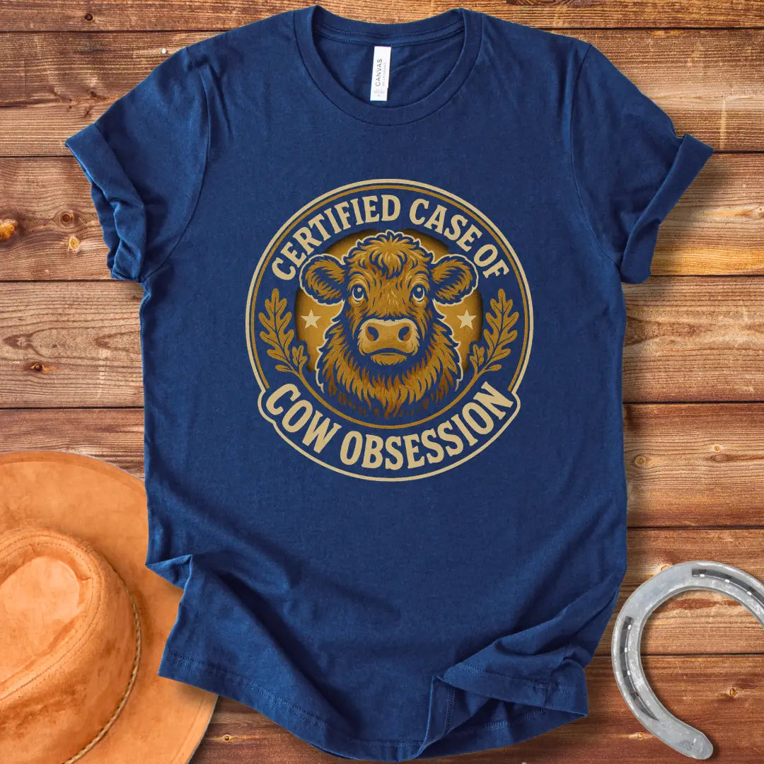 Illustration of a fluffy cow with the words 'Certified Case of Cow Obsession' around it.