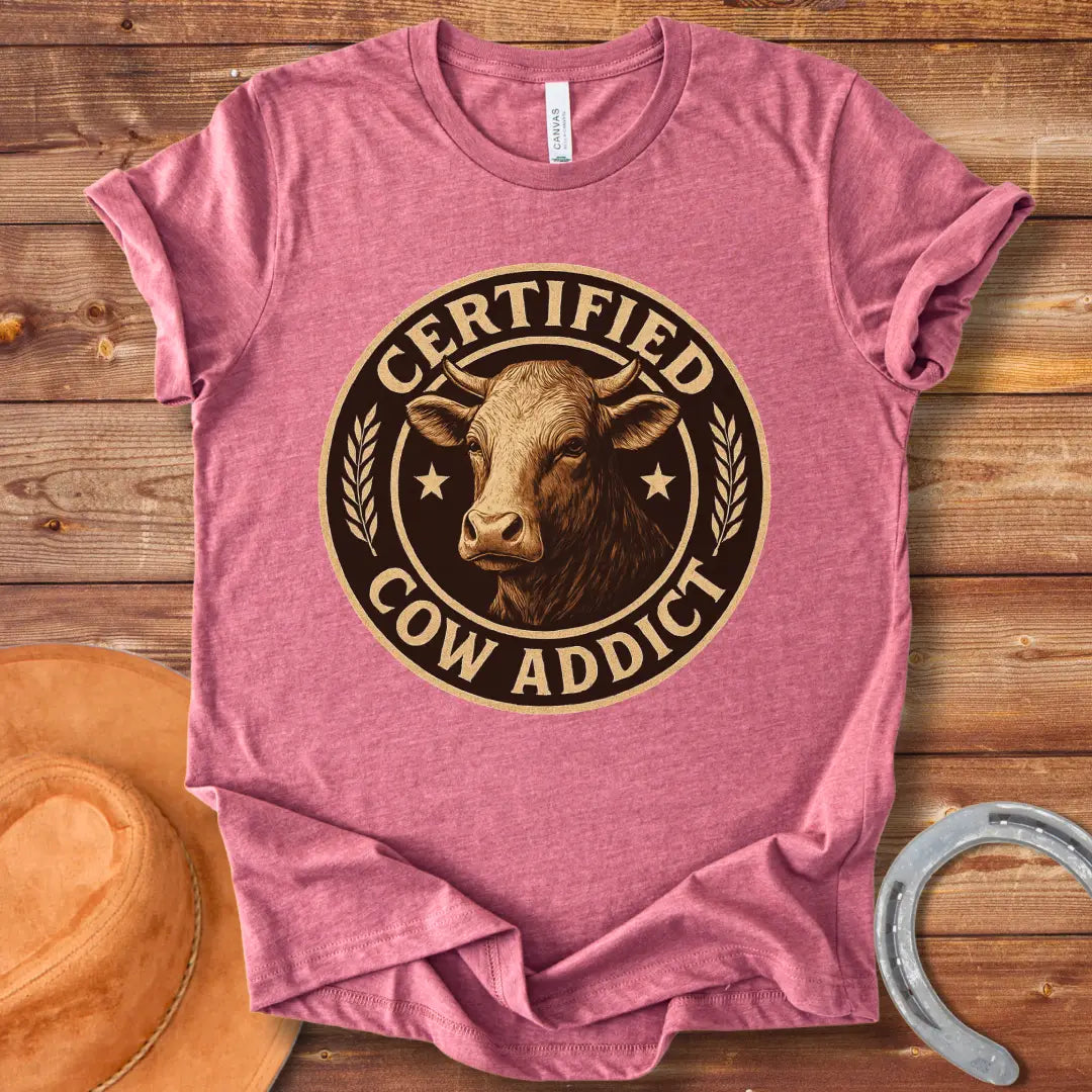 Certified Cow Addict T-Shirt design featuring a detailed cow portrait inside a circular badge.