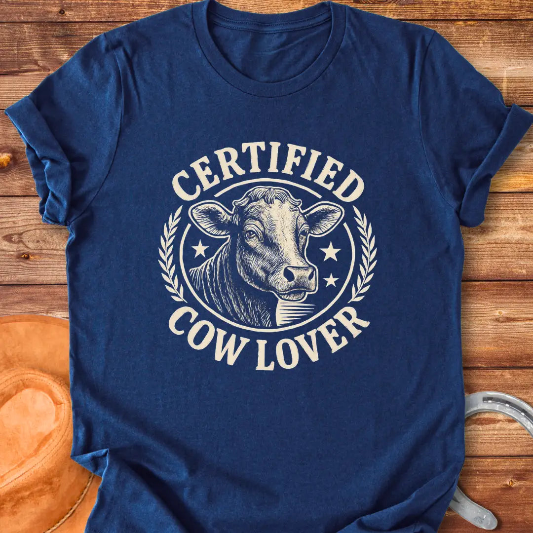 Vintage dark t-shirt with a detailed illustration of a cow and text that says 'Certified Cow Lover'.