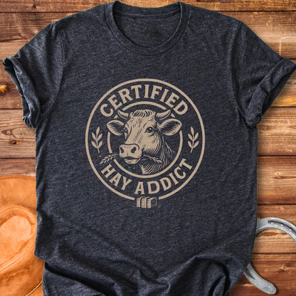 Certified Hay Addict T-Shirt featuring a cow illustration within a circle with text