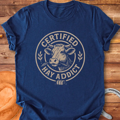 Certified Hay Addict T-Shirt featuring a cow illustration within a circle with text