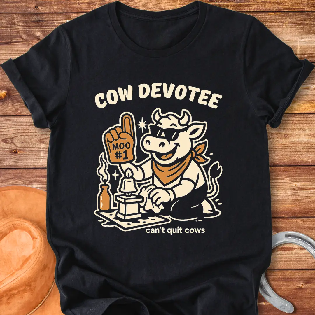 Cow Devotee T-Shirt design featuring a cool cow wearing sunglasses and a bandana, holding a foam finger that says Moo #1