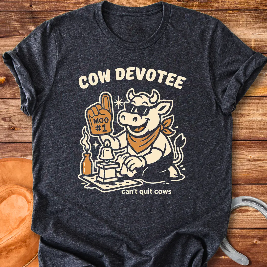 Cow Devotee T-Shirt design featuring a cool cow wearing sunglasses and a bandana, holding a foam finger that says Moo #1