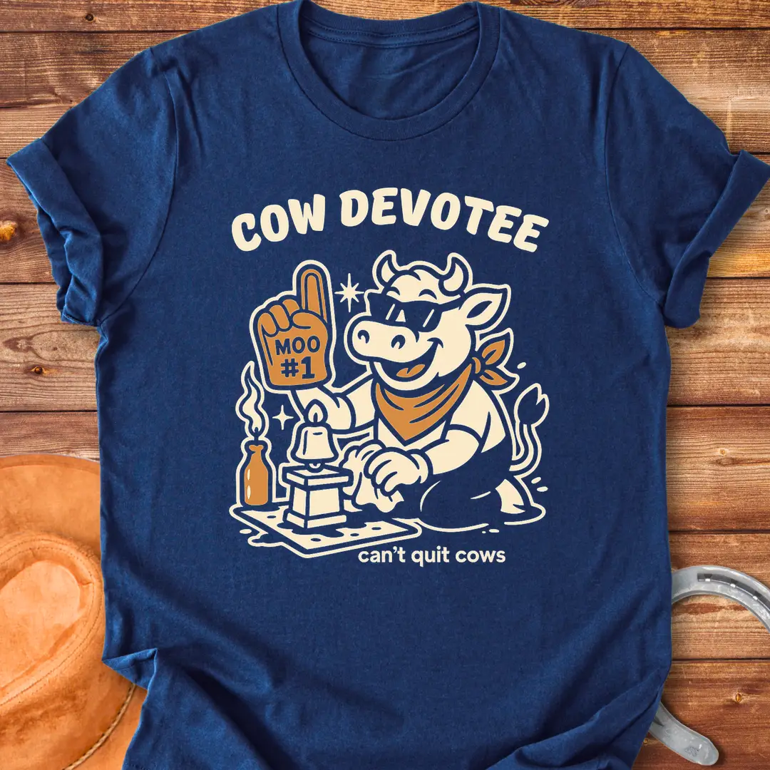 Cow Devotee T-Shirt design featuring a cool cow wearing sunglasses and a bandana, holding a foam finger that says Moo #1