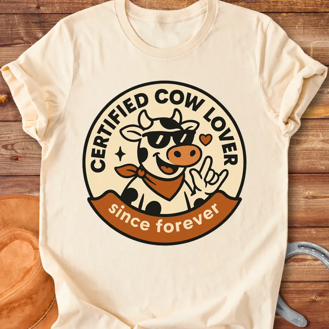 Certified Cow Lover T-shirt design featuring a cool cow wearing sunglasses and a bandana, with the words 'Certified Cow Lover' and 'Since Forever'.