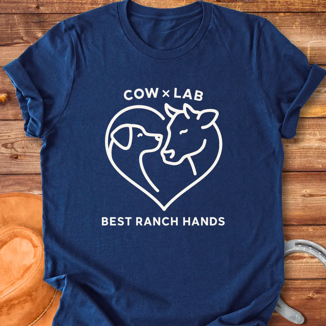 Cow x Lab T-Shirt design featuring a cow and a dog embracing within a heart shape, with the words 'Best Ranch Hands' at the bottom.