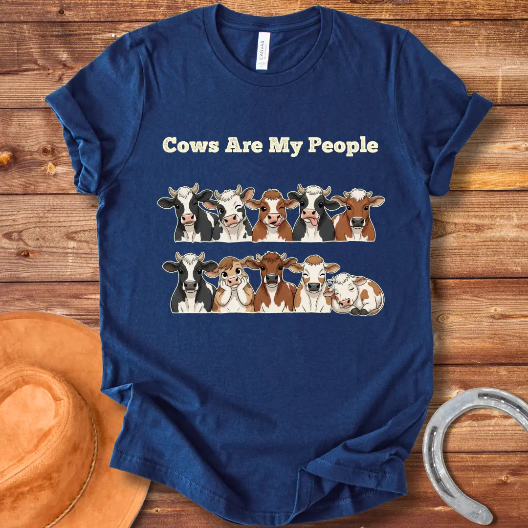 Cows Are My People T-shirt featuring a design of cartoon cows winking and smiling