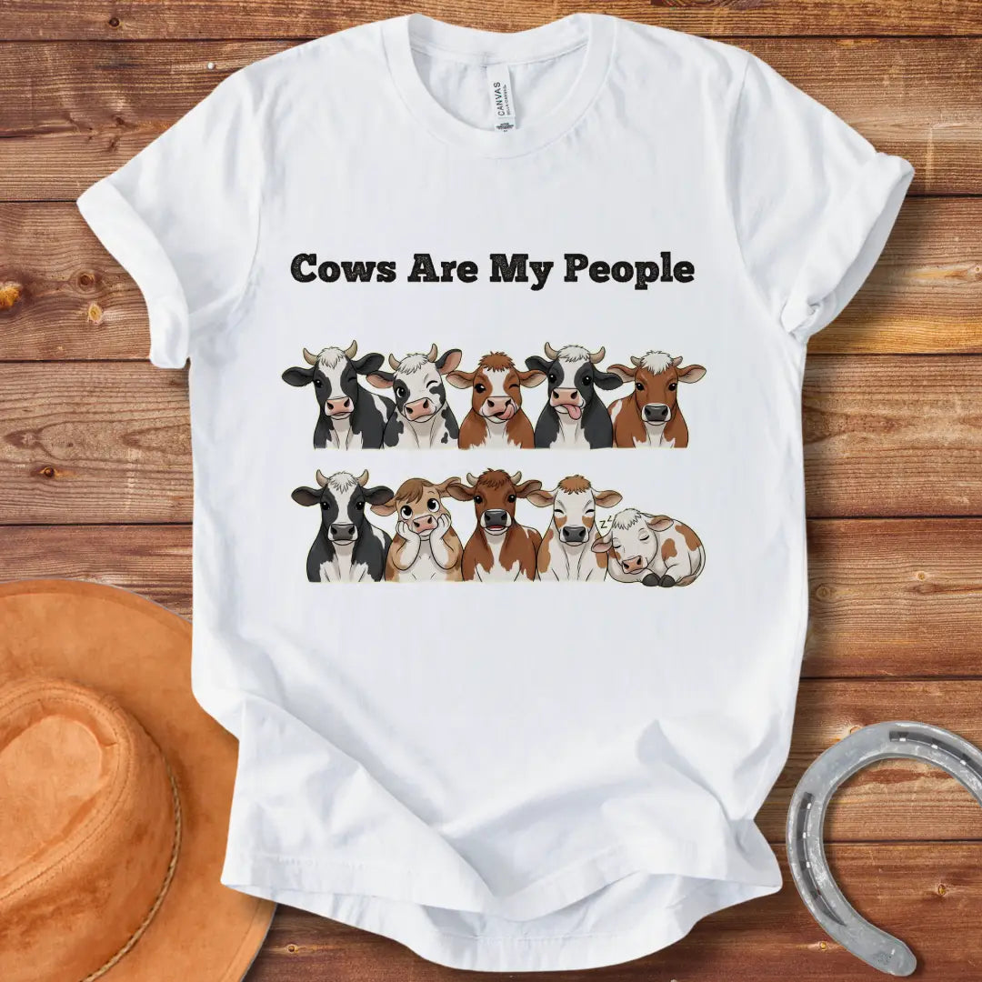 Cows Are My People T-shirt featuring a design of cartoon cows winking and smiling
