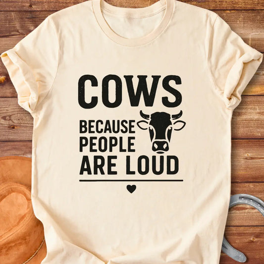 Black t-shirt with the text 'Cows Because People Are Loud' and a cow silhouette, a heart beneath the text.