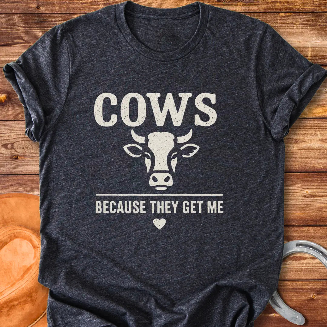 Cow face t-shirt design with the words 'Cows Because They Get Me' underneath.