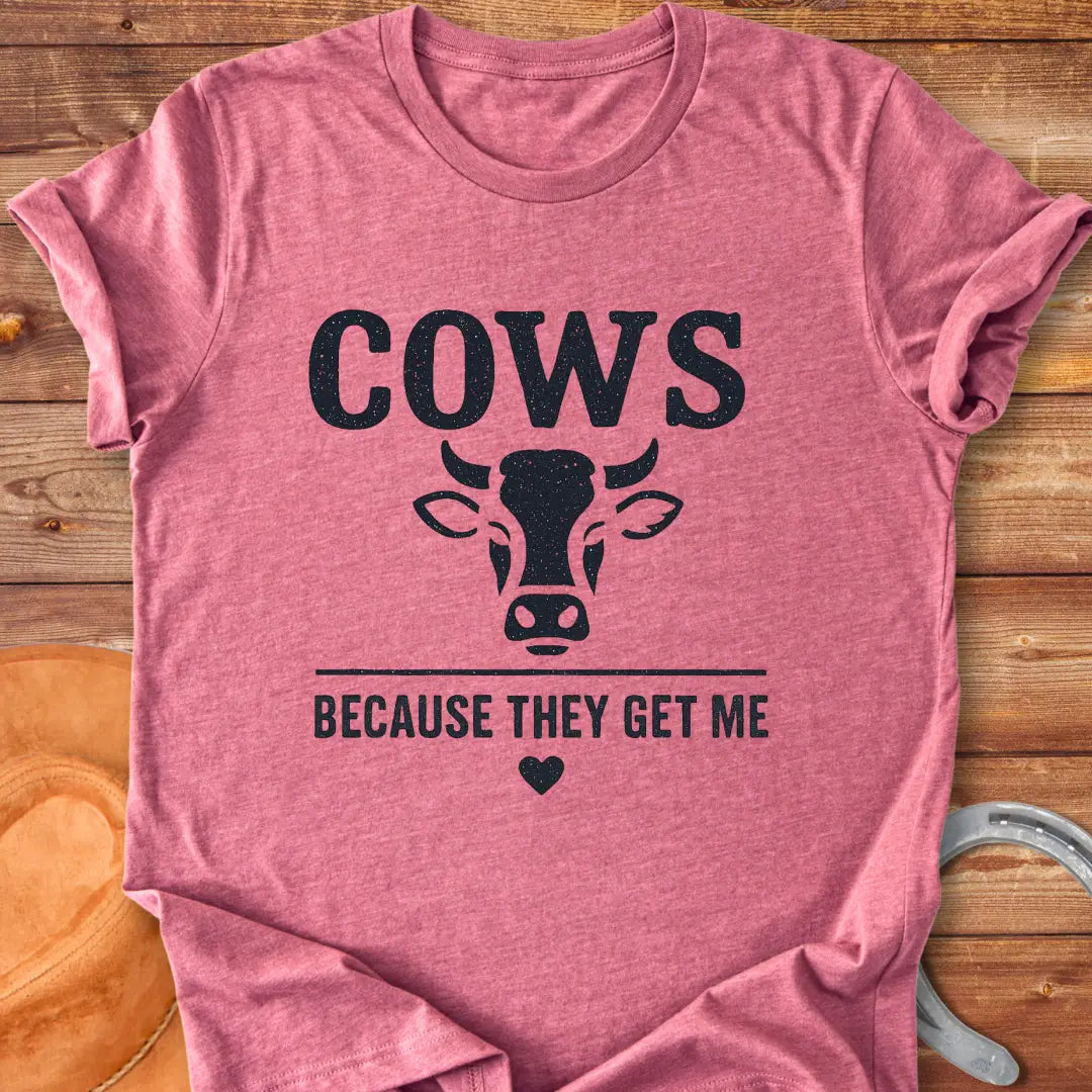Cow face t-shirt design with the words 'Cows Because They Get Me' underneath.