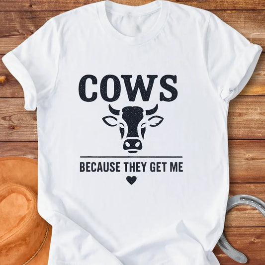 Cow face t-shirt design with the words 'Cows Because They Get Me' underneath.