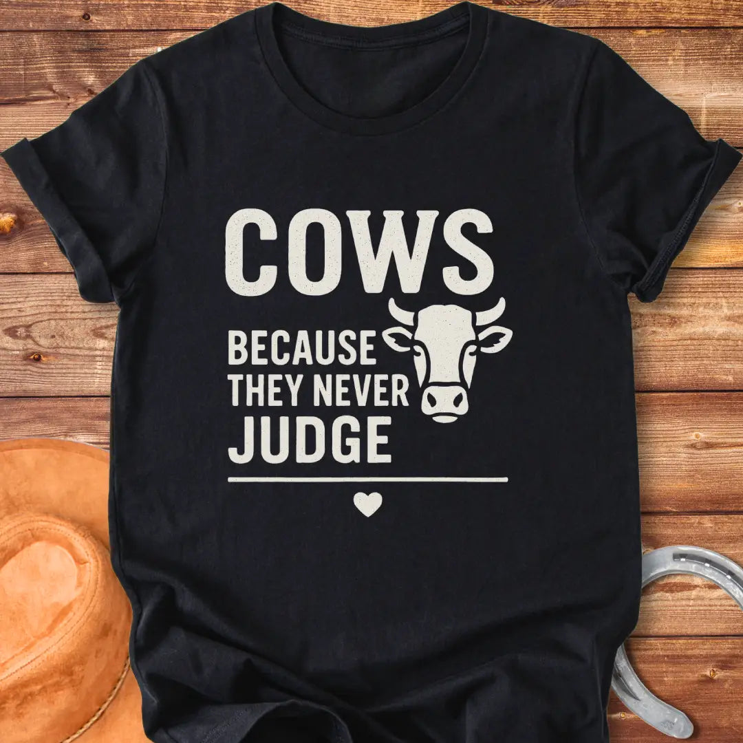 Cows Because They Never Judge T-Shirt design featuring a cow illustration
