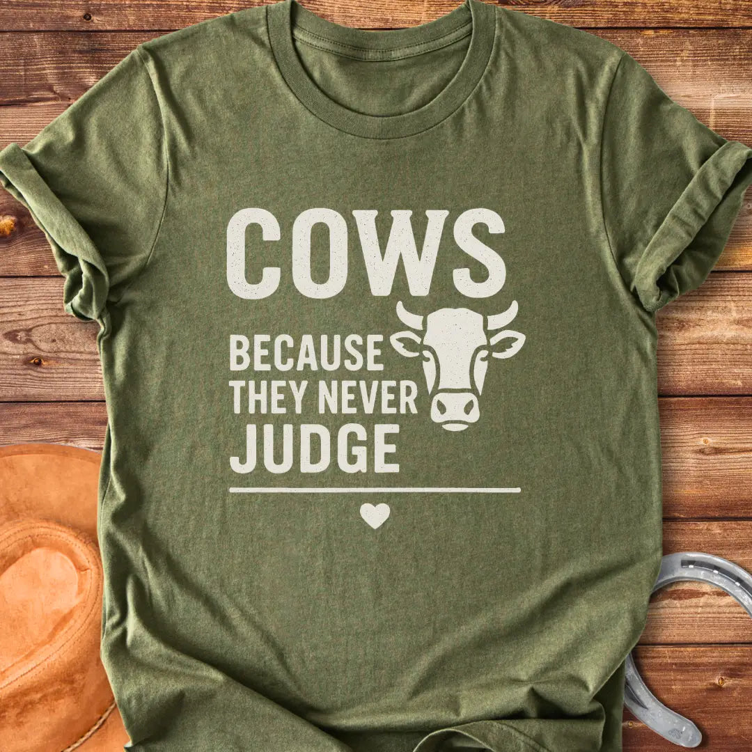 Cows Because They Never Judge T-Shirt design featuring a cow illustration
