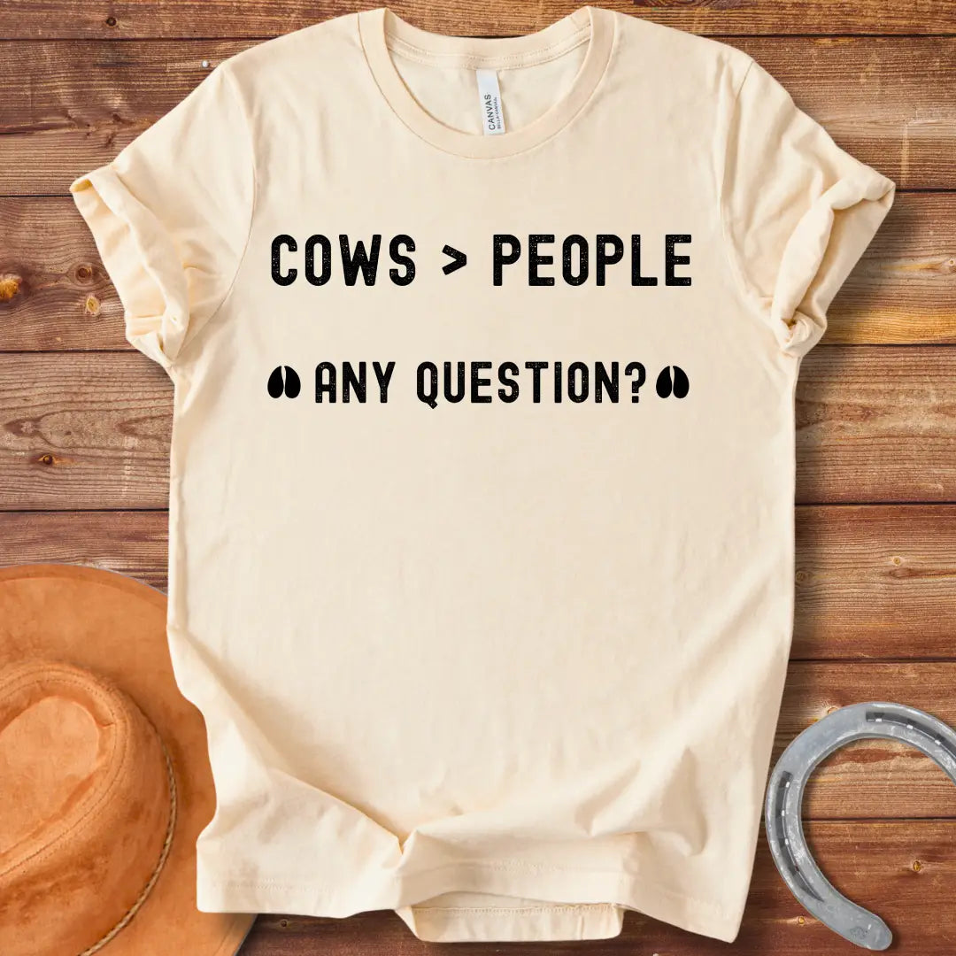 Cows Greater Than People T-Shirt design from Cow Lovers Clothing, showcasing a fun and playful cow-loving sentiment.