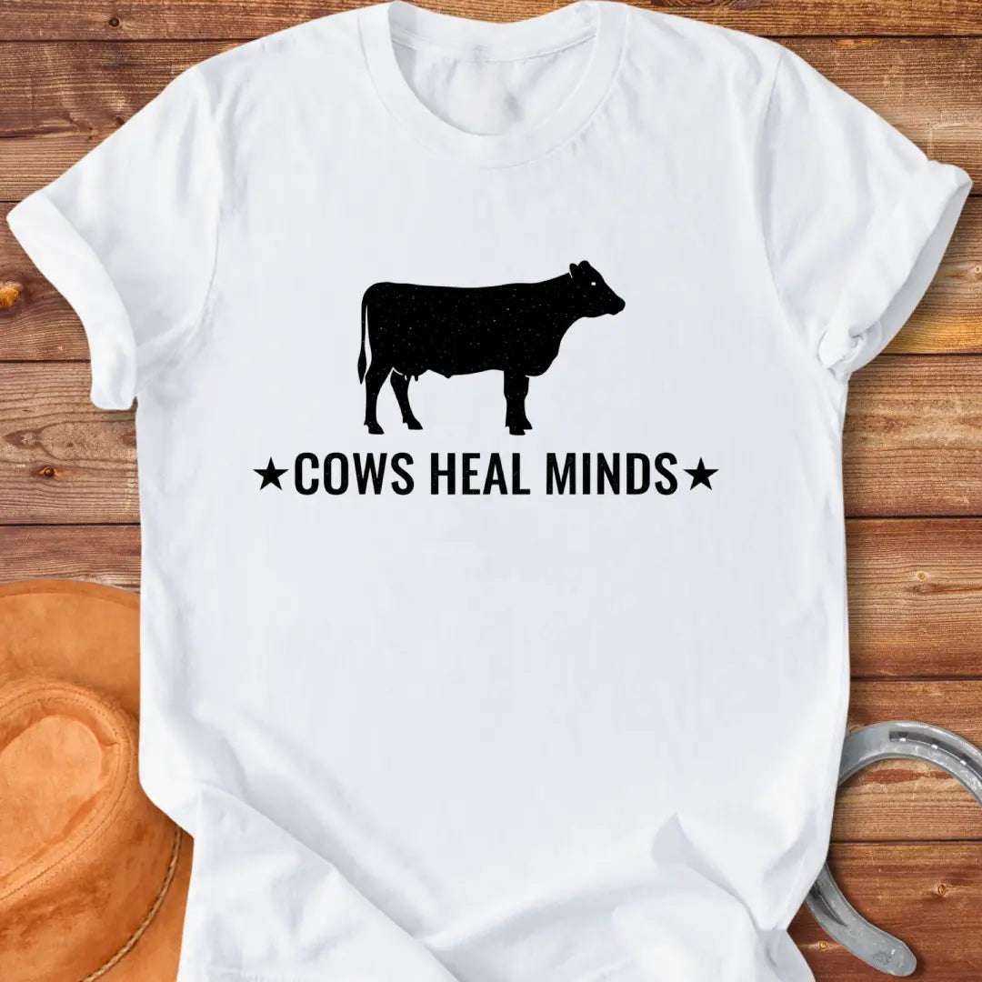 Cows Heal Minds T-Shirt design featuring a starry cow silhouette
