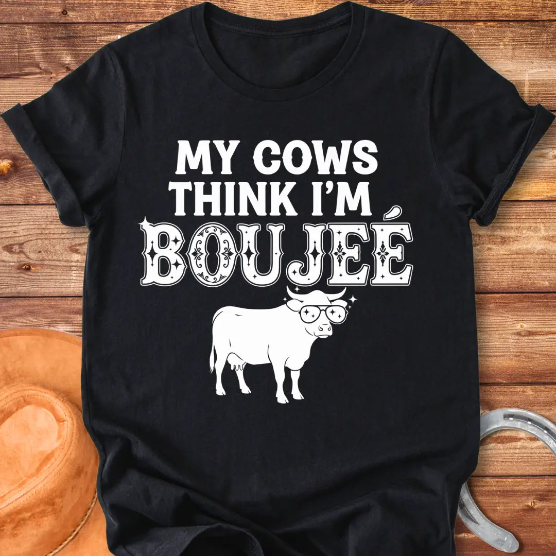 A cow wearing sunglasses with the text 'My Cows Think I'm Boujee' on a black background.
