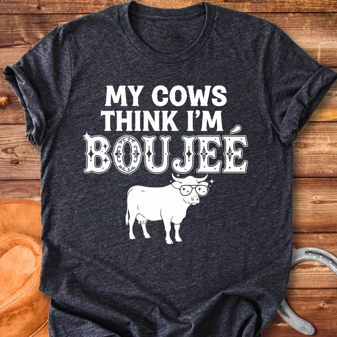 A cow wearing sunglasses with the text 'My Cows Think I'm Boujee' on a black background.