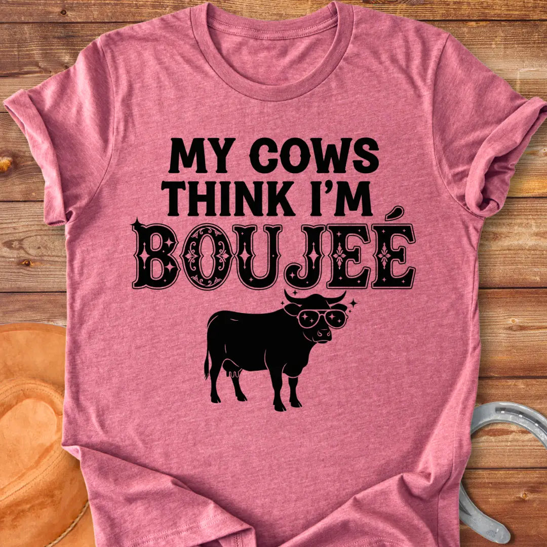 A cow wearing sunglasses with the text 'My Cows Think I'm Boujee' on a black background.
