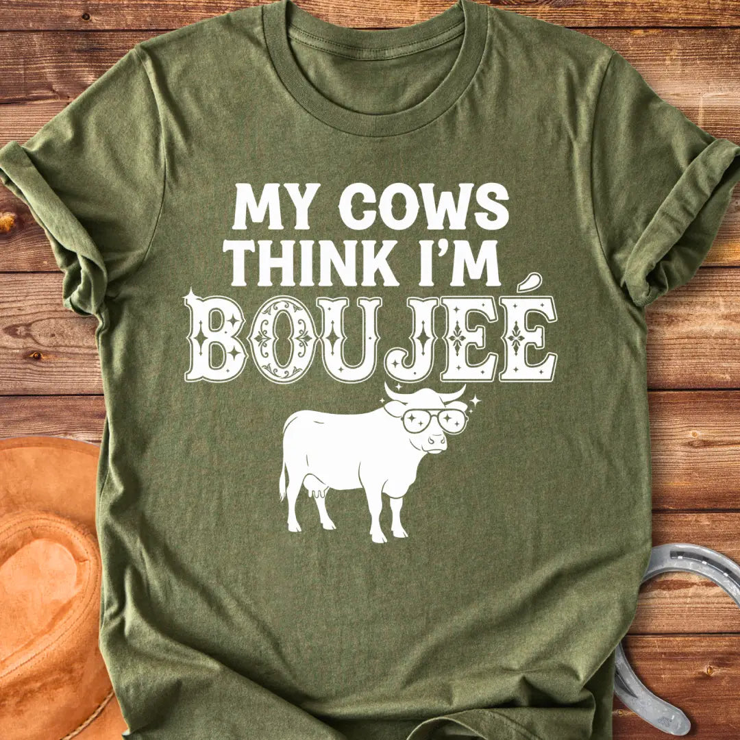 A cow wearing sunglasses with the text 'My Cows Think I'm Boujee' on a black background.