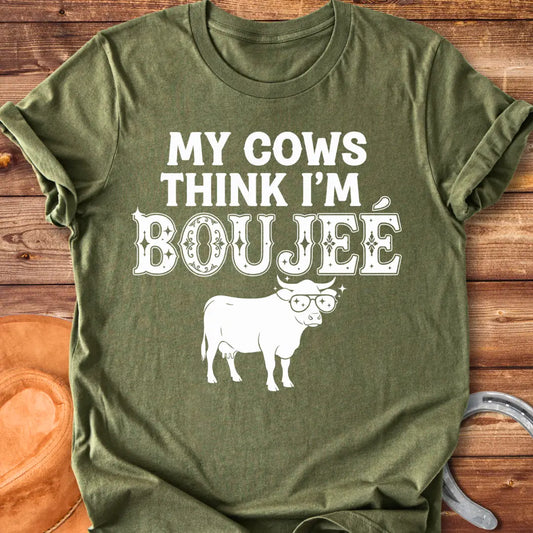 A cow wearing sunglasses with the text 'My Cows Think I'm Boujee' on a black background.