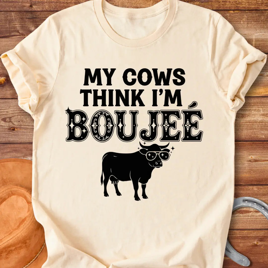 A cow wearing sunglasses with the text 'My Cows Think I'm Boujee' on a black background.