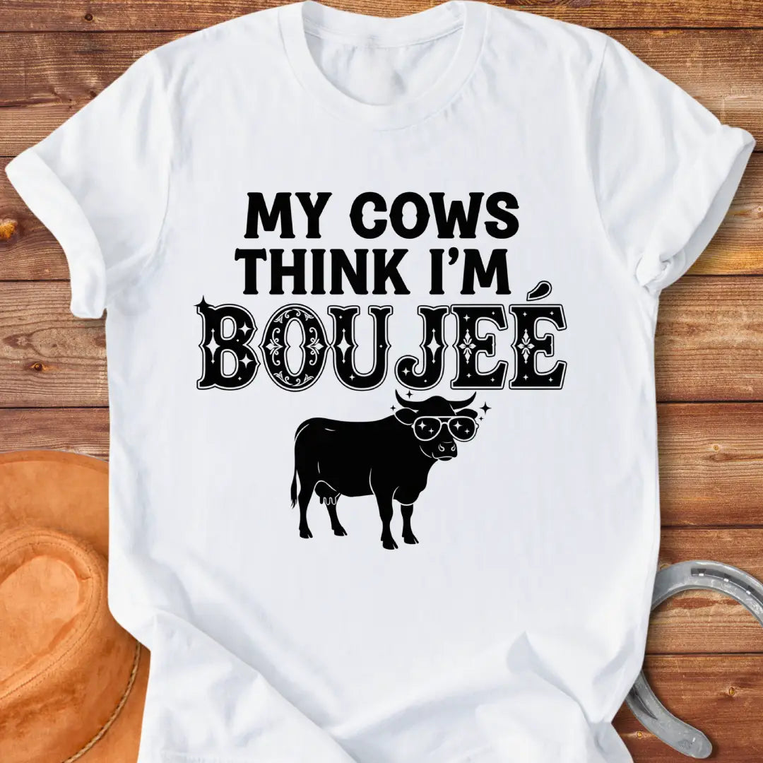 A cow wearing sunglasses with the text 'My Cows Think I'm Boujee' on a black background.