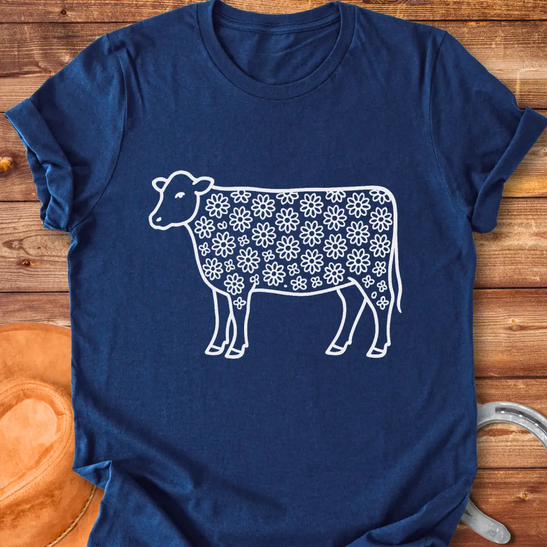 Line art illustration of a cow with a floral pattern filling the body