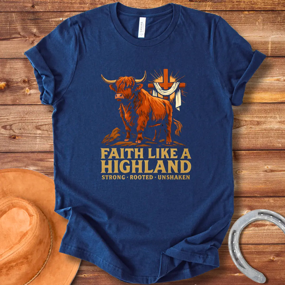 Highland cow t-shirt design with a cross and the words Faith Like A Highland. A brown cow stands in front of a cross.