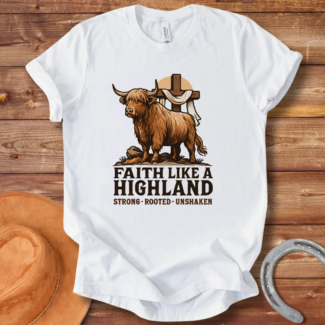 Highland cow t-shirt design with a cross and the words Faith Like A Highland. A brown cow stands in front of a cross.
