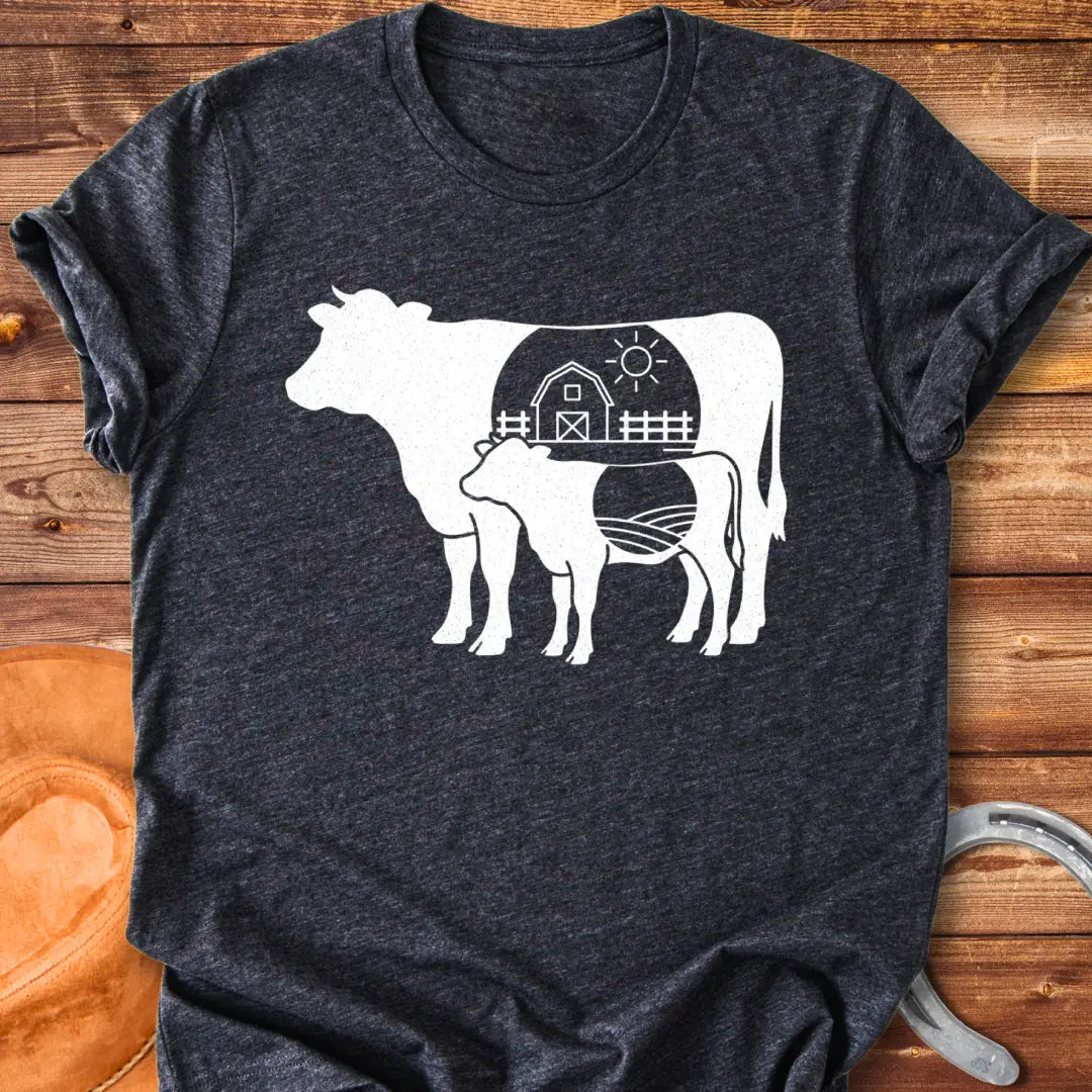 Farmstead Mama and Calf Silhouette T-Shirt featuring a silhouette of a mother cow and calf with a farm scene inside.