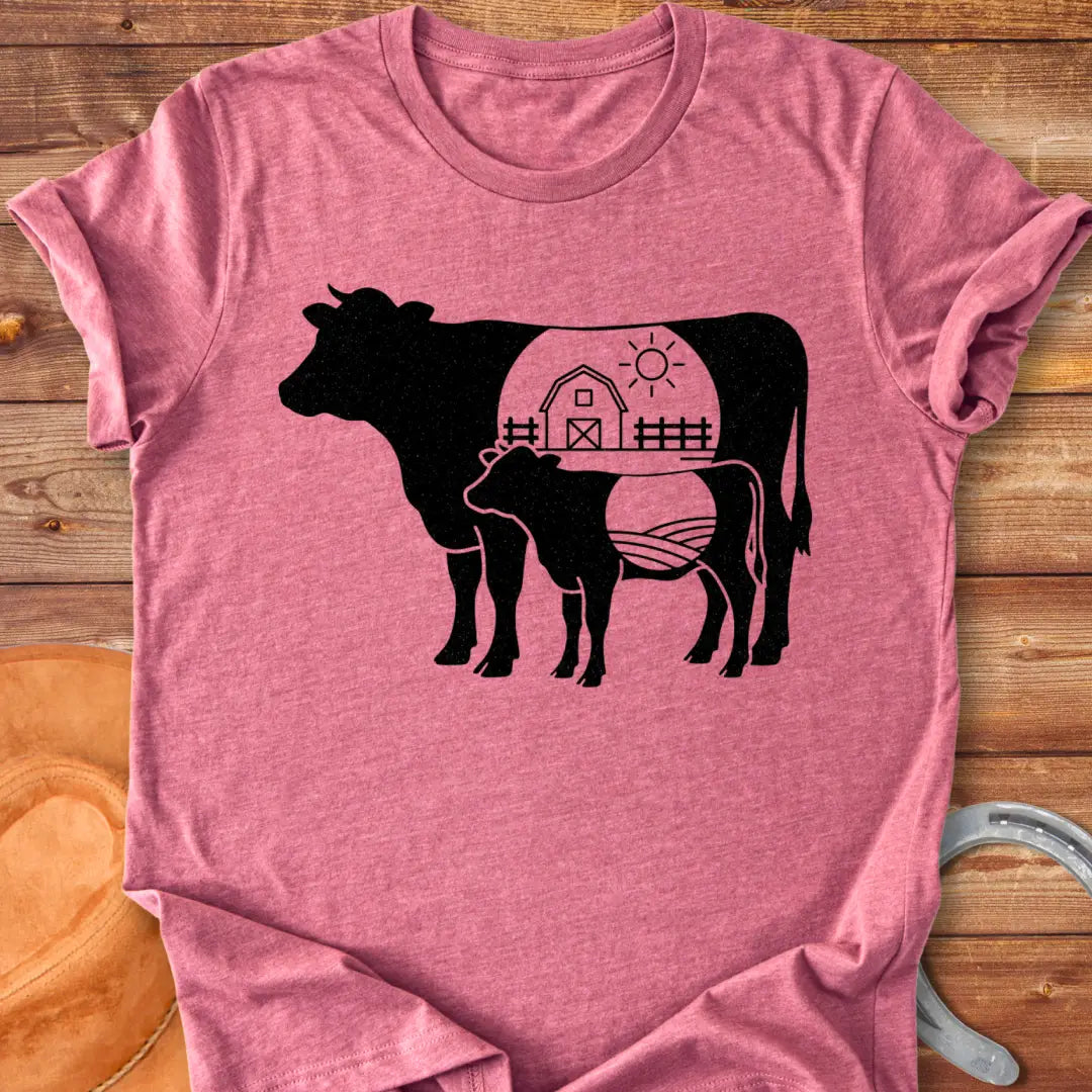 Farmstead Mama and Calf Silhouette T-Shirt featuring a silhouette of a mother cow and calf with a farm scene inside.