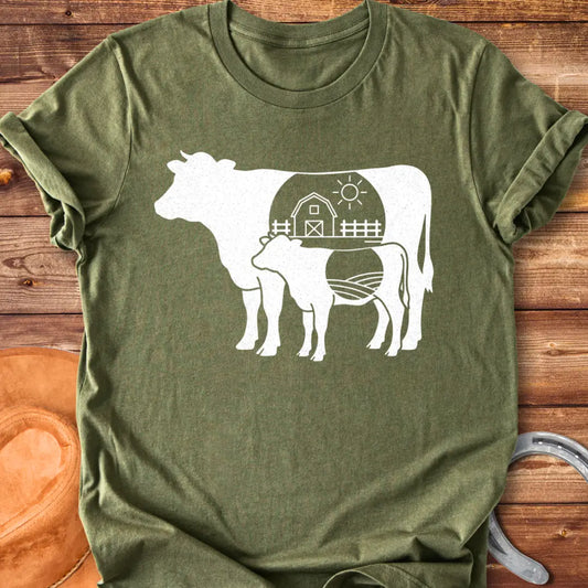 Farmstead Mama and Calf Silhouette T-Shirt featuring a silhouette of a mother cow and calf with a farm scene inside.