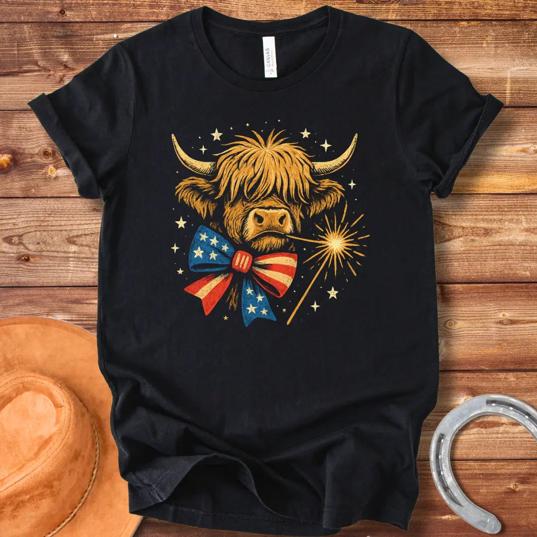Festive patriotic Highland cow wearing a patriotic bow tie holding a sparkler.