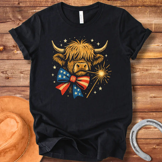 Festive patriotic Highland cow wearing a patriotic bow tie holding a sparkler.