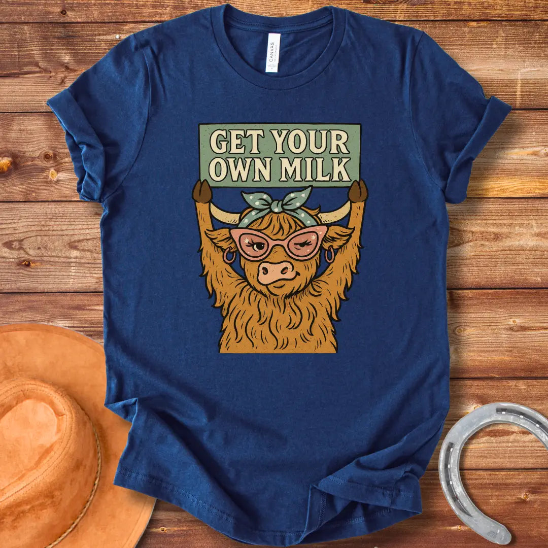 A sassy highland cow wearing sunglasses, holding a sign that reads 'Get Your Own Milk'