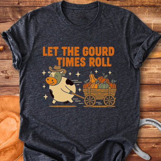 Cow pulling a wagon full of pumpkins with the text 'Let the Gourd Times Roll' – a fall-themed t-shirt design from Cow Lovers Clothing.