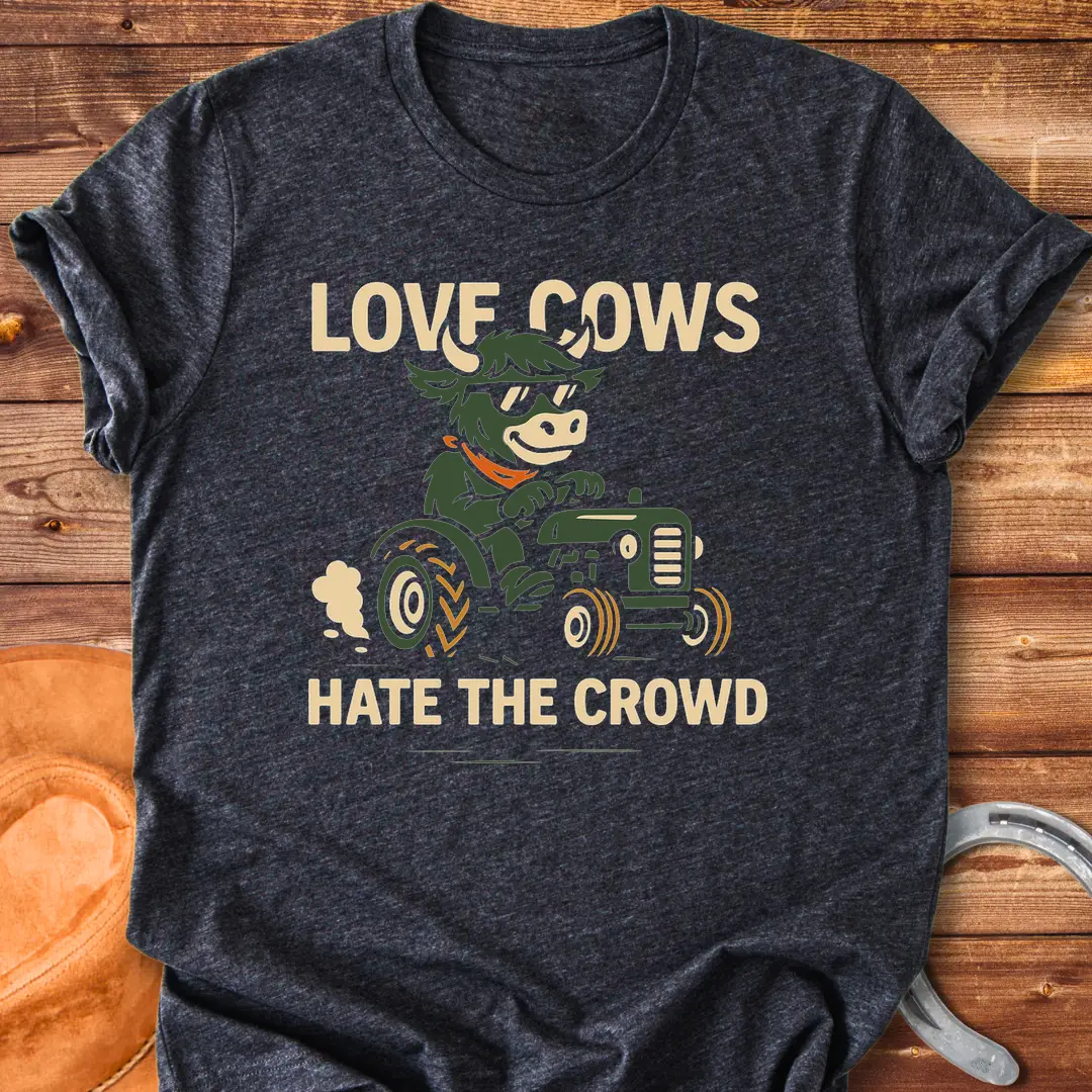 Cool cow in sunglasses driving a tractor, the text says: Love Cows, Hate The Crowd