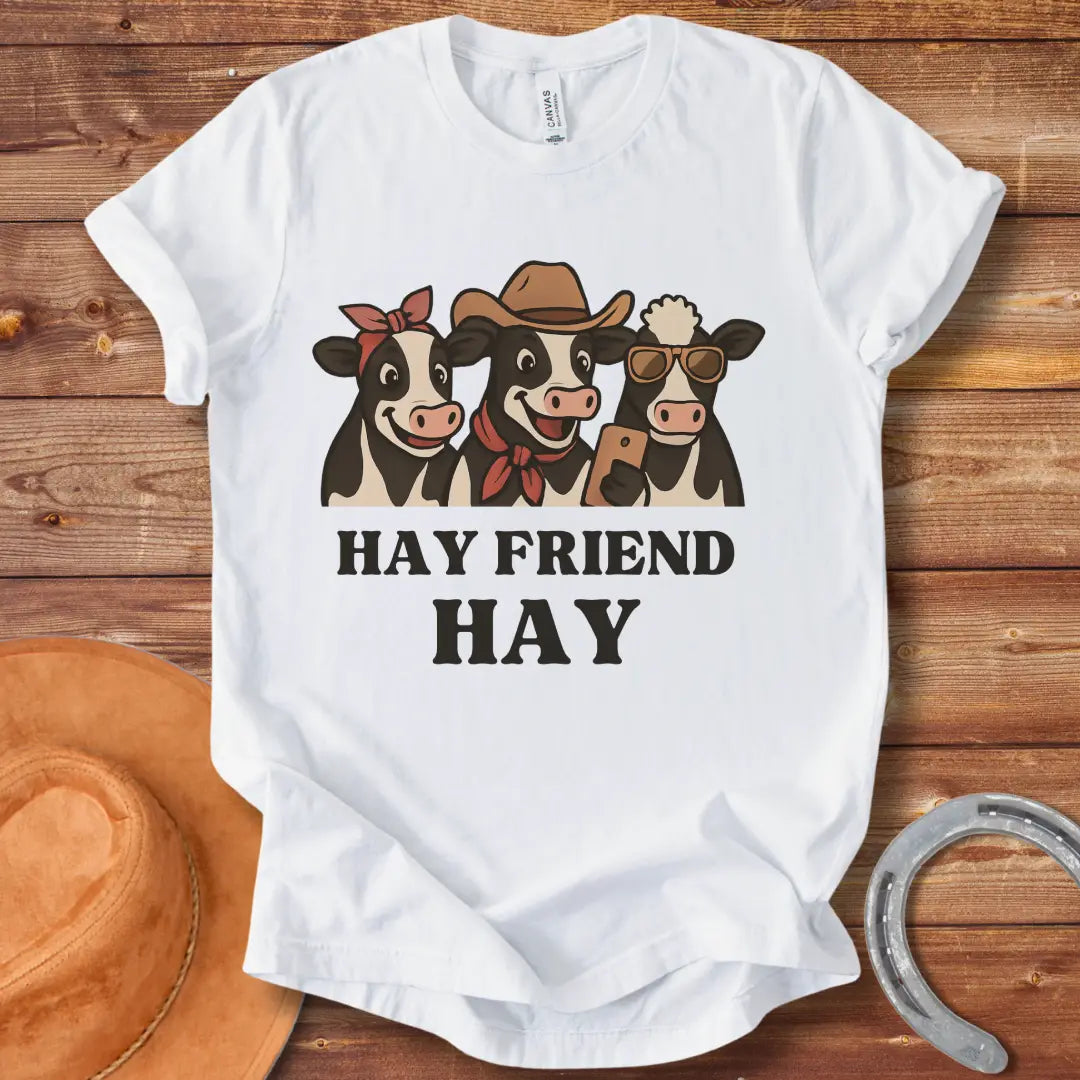 Hay Friend Hay T-Shirt featuring three happy cows with a western look.