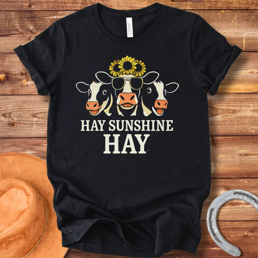 Hay Sunshine Hay T-Shirt featuring three smiling cows, one wearing sunglasses and a sunflower crown.