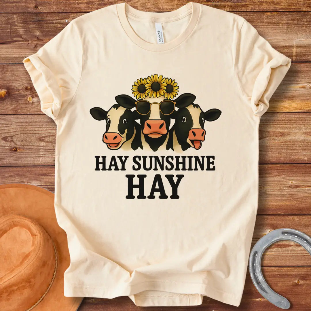 Hay Sunshine Hay T-Shirt featuring three smiling cows, one wearing sunglasses and a sunflower crown.
