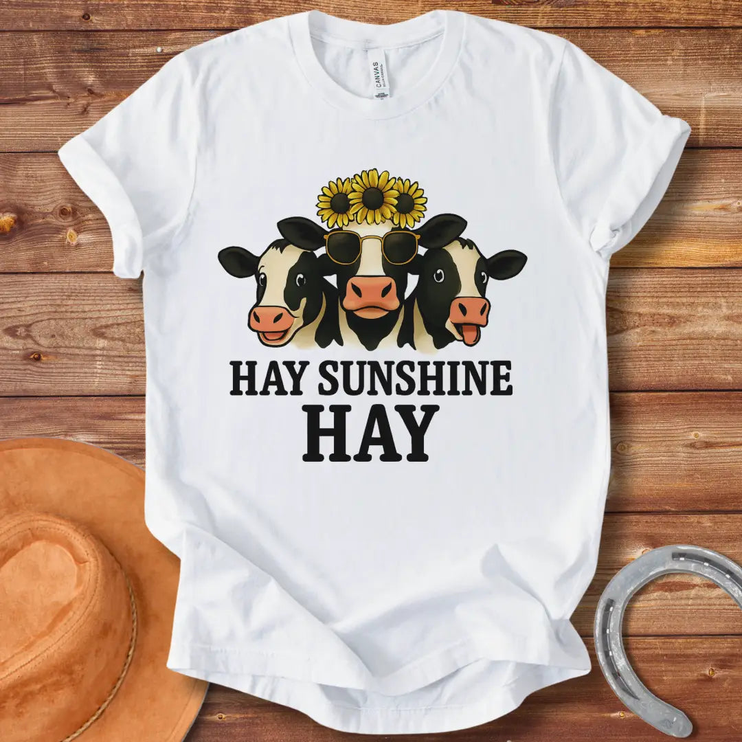 Hay Sunshine Hay T-Shirt featuring three smiling cows, one wearing sunglasses and a sunflower crown.