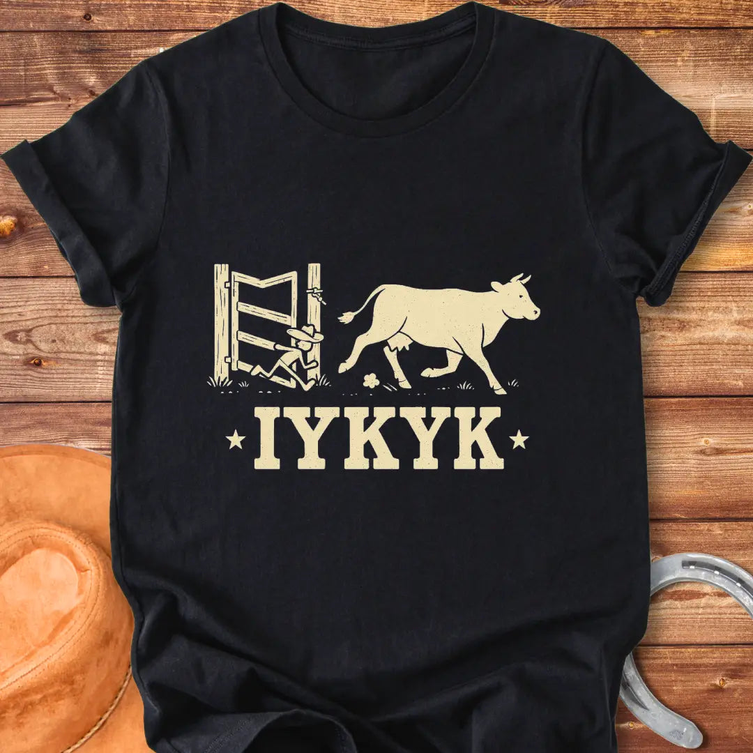 Silhouette of a cow running through an open gate with IYKYK text below.