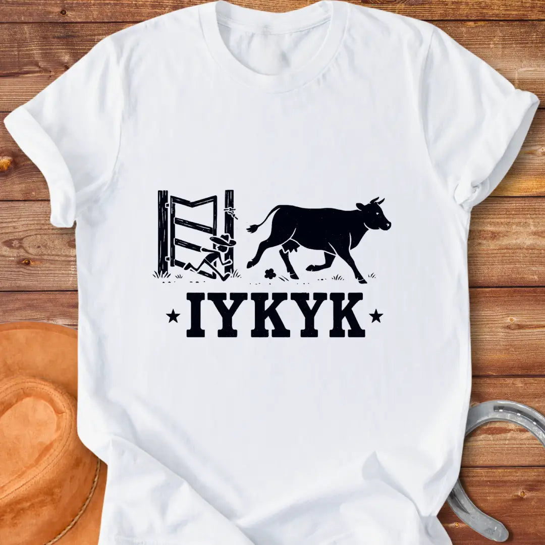 Silhouette of a cow running through an open gate with IYKYK text below.