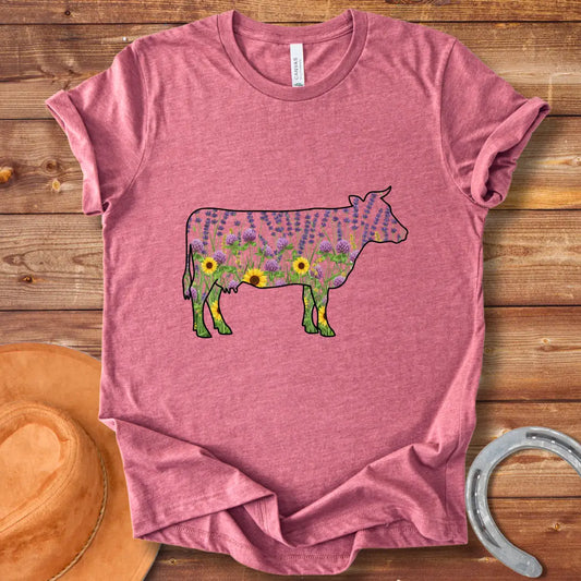 Silhouette of a cow filled with lavender, sunflowers, and clover flowers.
